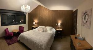 Postel nebo postele na pokoji v ubytování La Chambre Enchantée + 37 fotografií
