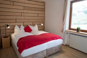 Кровать или кровати в номере Kuckucksnester Friedenweiler