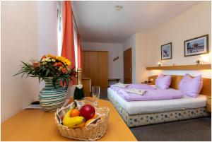 Letto o letti in una camera di Gasthof Weingrill