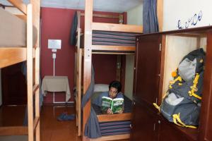 Letto o letti in una camera di Papachos Hostel
