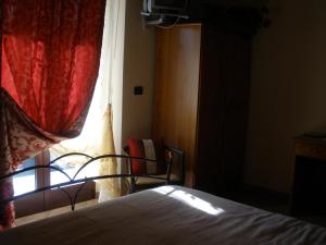 Postel nebo postele na pokoji v ubytování Agriturismo Monbertola