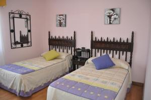 Llit o llits en una habitació de CASA AUREA DE CACHEIRAS