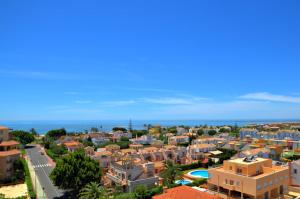 an aerial view of a city with buildings at Leo Canela in Isla Canela