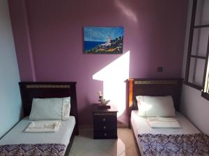 Uma cama ou camas num quarto em TanjaLucia Hostel