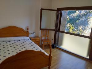 Postel nebo postele na pokoji v ubytování TU APARTAMENTO EN FORMIGAL-PANTICOSA SALLENT-Escarrilla