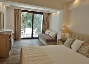 Krevet ili kreveti u jedinici u okviru objekta Hotel Pilalidis