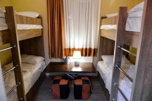 Postel nebo postele na pokoji v ubytování HOSTEL LOOK