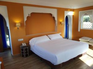 Postel nebo postele na pokoji v ubytování Beach Hotel Dos Mares