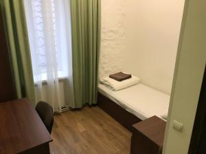 Postel nebo postele na pokoji v ubytování FOX Hostel
