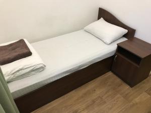 Postel nebo postele na pokoji v ubytování FOX Hostel
