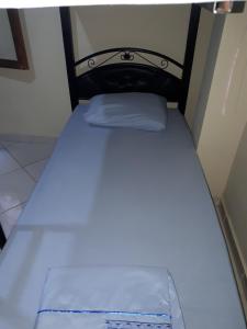 Uma cama ou camas num quarto em TanjaLucia Hostel