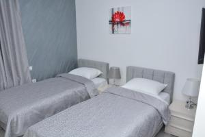 Ein Bett oder Betten in einem Zimmer der Unterkunft TREF