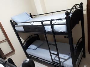 Uma cama ou camas num quarto em TanjaLucia Hostel