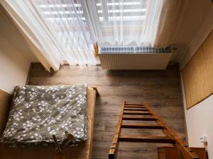 Katil atau katil-katil dalam bilik di Apartmán U Sjezdovky