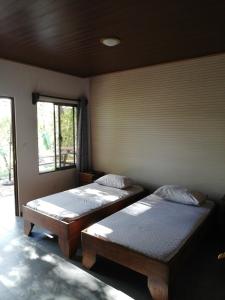 Ένα ή περισσότερα κρεβάτια σε δωμάτιο στο Casa Taupe