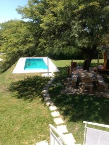Bazén v ubytování Casa en Villa Los Aromos nebo v jeho okolí + 14 fotografií
