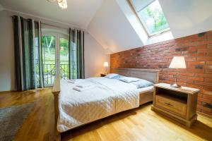 Postel nebo postele na pokoji v ubytování Villa Ulinia + 25 fotografií