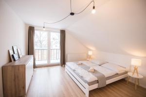 Posteľ alebo postele v izbe v ubytovaní Nordic House