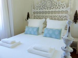 Cama ou camas em um quarto em Villa Margaridi