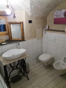 Ванна кімната в Osteria l'iero d'Eima'