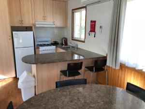 A kitchen or kitchenette at Toora Tourist Park