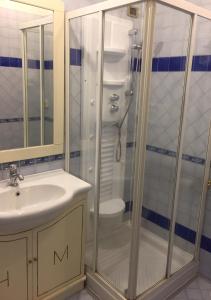 Koupelna v ubytování Hotel Malaga