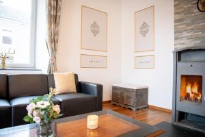 Posezení v ubytování Zythogite Appartement 8 personnes avec jardin, bbq