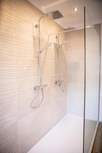 Koupelna v ubytování Zythogite Appartement 8 personnes avec jardin, bbq