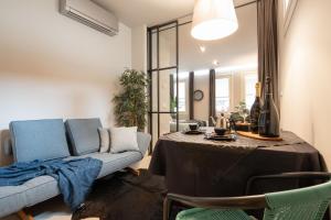 A seating area at OFFICINE CAVOUR Piazza Cavour