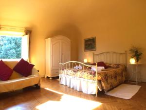 เตียงในห้องที่ Villa Pieve De' Pitti