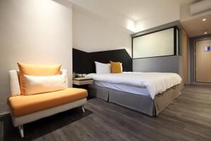 Postel nebo postele na pokoji v ubytování Hai Sheng Wei B&B
