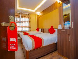 Postel nebo postele na pokoji v ubytování Hotel Deepshree