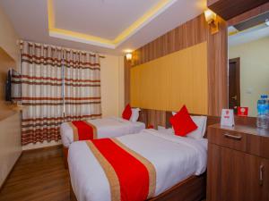 Postel nebo postele na pokoji v ubytování Hotel Deepshree