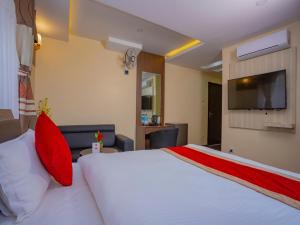 Postel nebo postele na pokoji v ubytování Hotel Deepshree
