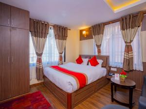 Postel nebo postele na pokoji v ubytování Hotel Deepshree