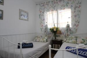 Posteľ alebo postele v izbe v ubytovaní ARENDA Villa Flandes Pino Alto