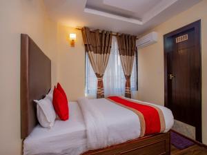 Postel nebo postele na pokoji v ubytování Hotel Deepshree