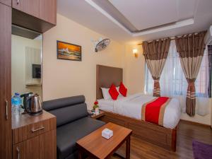 Postel nebo postele na pokoji v ubytování Hotel Deepshree