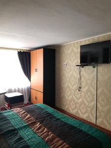 Postel nebo postele na pokoji v ubytování Карпатська Мавка