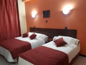 Katil atau katil-katil dalam bilik di Hotel Lixus
