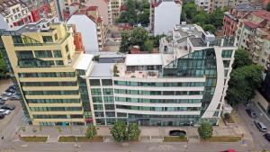 an overhead view of a large building in a city at Central West Hotel in Sofia