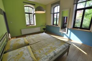 Postel nebo postele na pokoji v ubytování MCM Comfort Apartments