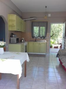 Kuchyň nebo kuchyňský kout v ubytování Mina Apartments