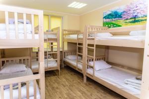 Кровать или кровати в номере BOTANIC GLOBUS HOSTEL