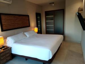 Postel nebo postele na pokoji v ubytování Beach Hotel Dos Mares