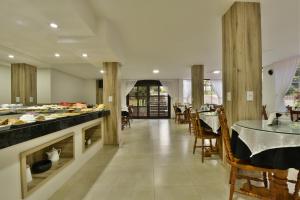 ห้องอาหารหรือที่รับประทานอาหารของ Hotel Pequeno Bosque