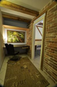 Posezení v ubytování MCM Comfort Apartments