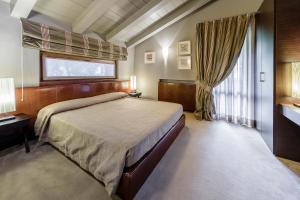 Posteľ alebo postele v izbe v ubytovaní Hotel Lajadira & Spa
