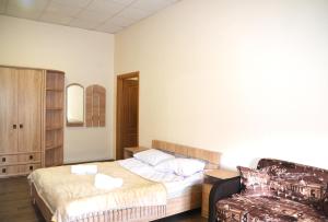 Postel nebo postele na pokoji v ubytování Coin Apartments & Poshtel