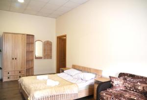 Postel nebo postele na pokoji v ubytování Coin Apartments & Poshtel